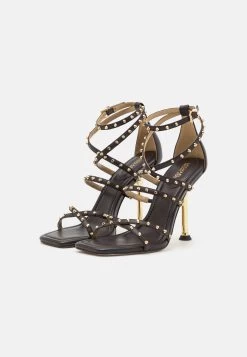 MICHAEL Michael Kors Imani Strappy- Sandalen - Chocolate 9 MICHAEL Michael Kors Imani Strappy- Sandalen - Chocolate -Chique Schoenen Winkel c7ea96a8fd214fd19bfa61f5664e9c3e