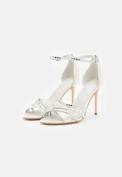 Guess Kadisha - Sandalen Met Hoge Hak - Ivory -Chique Schoenen Winkel cf1ff356ef354bab8943221dfb924a4e